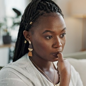 Closeup of woman biting her nails