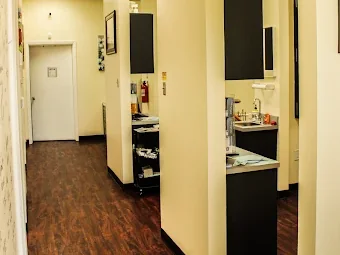 Hallway to the treatment rooms at Sonria Dentista Commerce